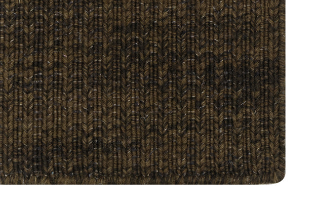 Close-up of Brown Texture Hand-Woven Soumak woolen rug for bed rooms, offices, and dining spaces. 