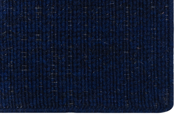 Clouse-up of Navy Blue Texture Hand-Woven Soumak woolen rug for bed rooms, offices, and dining spaces. 