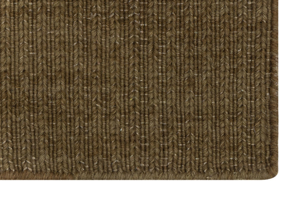 Close-up of Brown Texture Hand-Woven Soumak woolen rug for bed rooms, offices, and dining spaces. 