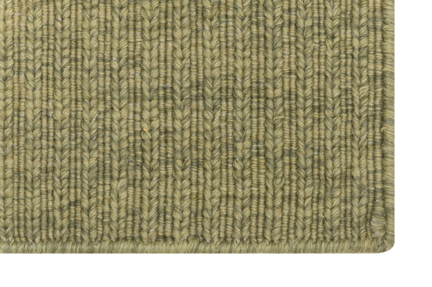 Close-up of Green Texture Hand-Woven Soumak woolen rug for bed rooms, offices, and dining spaces. 